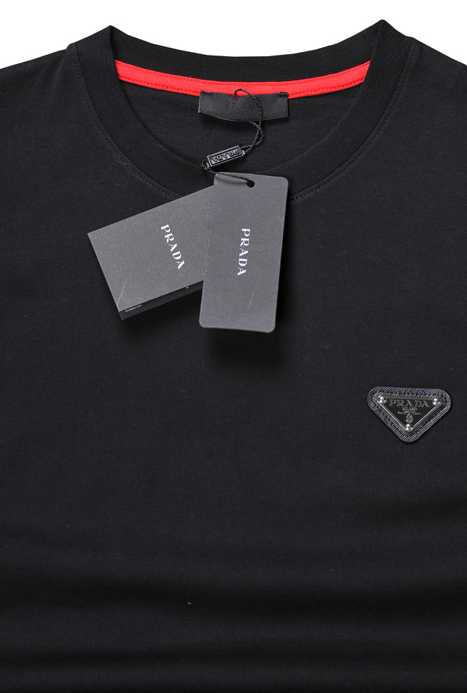 Mens Designer Clothes | PRADA Men's t-shirt in black with metal logo patch 122